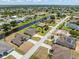 Wide aerial shot showcasing the property near canal ways within a scenic residential community at 39 Medalist Ln, Rotonda West, FL 33947