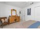 Bedroom with a dresser, wicker chair, and a closet at 39 Medalist Ln, Rotonda West, FL 33947