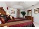 Spacious bedroom features tray ceilings, large windows and a ceiling fan at 39 Medalist Ln, Rotonda West, FL 33947