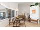 Bright breakfast nook adjacent to living area, perfect for casual dining at 39 Medalist Ln, Rotonda West, FL 33947