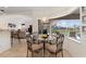 Cozy breakfast nook with large windows offering views of the pool and backyard at 39 Medalist Ln, Rotonda West, FL 33947
