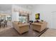 Comfortable living room with access to the lanai and views of the pool at 39 Medalist Ln, Rotonda West, FL 33947