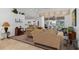 Cozy living room with neutral tones, plush seating, and view of the lanai at 39 Medalist Ln, Rotonda West, FL 33947