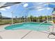 Inviting screened-in pool offers a refreshing escape with a picturesque view of the outdoors at 39 Medalist Ln, Rotonda West, FL 33947