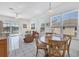 Breakfast nook with a view of the lanai and swimming pool at 4115 Hemingway Dr, Venice, FL 34293