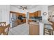 Well-equipped kitchen featuring stainless steel appliances, ample counter space, and tiled flooring at 4115 Hemingway Dr, Venice, FL 34293