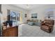Cozy living room with sliding glass doors leading to the outdoor living space and pool area at 4115 Hemingway Dr, Venice, FL 34293