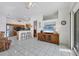 Open-concept living space including living room, dining area, and kitchen at 4115 Hemingway Dr, Venice, FL 34293