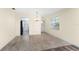 Cozy dining area with tile floors, chandelier and a view of the front door at 6796 Gasparilla Pines Blvd # 63, Englewood, FL 34224