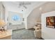 Bright bedroom with built-in beds, carpet flooring, and sloped ceilings at 6890 Palm Island Dr, Placida, FL 33946