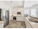 Well-lit kitchen with stainless steel appliances, granite countertops, and ample cabinet space at 6890 Palm Island Dr, Placida, FL 33946