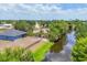 Waterfront property with fenced yard and screened lanai at 7332 Brandywine Dr, Englewood, FL 34224