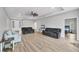 Spacious living room with a ceiling fan, recessed lighting, and an open layout to other rooms at 7332 Brandywine Dr, Englewood, FL 34224