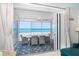 Covered patio featuring ocean views and a relaxing dining area at 7548 Palm Island S Dr # 1724, Placida, FL 33946