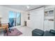 Bedroom with built-in storage and an attached balcony with ocean view at 7548 Palm Island S Dr # 1724, Placida, FL 33946
