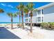 Charming beach house on stilts, surrounded by palm trees and pristine white sand at 7548 Palm Island S Dr # 1724, Placida, FL 33946