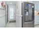 Bright kitchen area adjacent to the stainless steel refrigerator at 7548 Palm Island S Dr # 1724, Placida, FL 33946