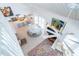 Open living space with modern décor, a ceiling fan, and an open view into the kitchen at 7548 Palm Island S Dr # 1724, Placida, FL 33946