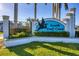 Community sign for South Gulf Cove featuring lush landscaping at 8180 Burwell Cir, Port Charlotte, FL 33981