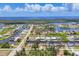 Aerial view of a waterfront community with canals and stunning water views at 8400 Antwerp Cir, Port Charlotte, FL 33981