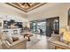 Open floorplan featuring a kitchen with breakfast bar, dining area and spacious living room at 8400 Antwerp Cir, Port Charlotte, FL 33981