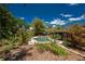 An inviting pool set in a landscaped backyard, creating a relaxing and private outdoor retreat at 875 Morrison Ave, Englewood, FL 34223