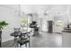 Bright kitchen featuring stainless steel appliances, ample cabinet space, and a cozy breakfast nook area at 1 Curacao Cir # 44, Englewood, FL 34223