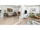 Inviting living room with tile floors and a coastal aesthetic at 1 Curacao Cir # 44, Englewood, FL 34223