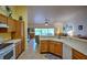 Well-lit kitchen featuring stainless appliances and ample cabinet space at 10064 Cocoa Beach St, Port Charlotte, FL 33981
