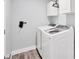 Laundry room with white washer and dryer at 129 David Blvd, Rotonda West, FL 33947