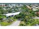 Aerial view of the community with lush landscaping and water views at 149 Englewood Isles Pkwy # 603, Englewood, FL 34223