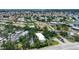 Aerial view of the community showcasing tree coverage and waterfront access at 149 Englewood Isles Pkwy # 603, Englewood, FL 34223