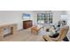 Comfortable living room featuring plenty of natural light and cozy seating arrangement at 149 Englewood Isles Pkwy # 603, Englewood, FL 34223