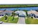 Beautiful waterfront home with well-maintained lawn, lush landscaping, and quick access to the water at 15176 Spanish Point Dr, Port Charlotte, FL 33981