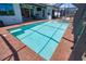 A shimmering blue pool and spa are perfect for warm days and offer a refreshing escape in this beautifully designed outdoor space at 15176 Spanish Point Dr, Port Charlotte, FL 33981