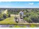 Aerial view showcasing the home's proximity to serene waterways and natural landscape at 161 Haddock Dr, Rotonda West, FL 33947