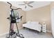 Bright bedroom with large window and room for exercise equipment at 161 Haddock Dr, Rotonda West, FL 33947