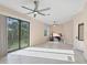 Bonus room with tile floors, ceiling fans, and sliding door access to the backyard and natural light at 161 Haddock Dr, Rotonda West, FL 33947