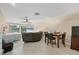 Spacious living room with a bed, a sofa, dining area and a TV at 161 Haddock Dr, Rotonda West, FL 33947
