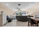 Open concept living room with a bed, sofa, dining area, and television at 161 Haddock Dr, Rotonda West, FL 33947