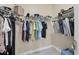 Spacious walk-in closet featuring built-in shelving, hanging rods, and ample storage for clothing and accessories at 161 Haddock Dr, Rotonda West, FL 33947