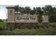 Stone monument sign for Rotonda West, a deed-restricted community, welcomes residents and guests at 174 Broadmoor Ln, Rotonda West, FL 33947