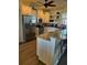 Well-equipped kitchen with stainless steel appliances, granite countertops, island and ample cabinet space at 174 Broadmoor Ln, Rotonda West, FL 33947