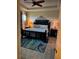 Comfortable main bedroom with tray ceiling, a king bed, and carpet at 174 Broadmoor Ln, Rotonda West, FL 33947