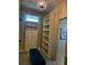 Spacious walk-in closet with custom shelving and plenty of storage space at 174 Broadmoor Ln, Rotonda West, FL 33947
