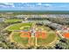 Baseball complex featuring several well-maintained fields and modern amenities, providing a top-notch facility for players and fans alike at 1836 W Isles Rd, Port Charlotte, FL 33953