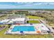 Community pool and park with seating, offering residents a convenient spot for relaxation and community gatherings at 1836 W Isles Rd, Port Charlotte, FL 33953
