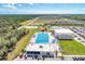 Community pool and splashpad near residential area, offering residents a convenient and fun aquatic escape at 1836 W Isles Rd, Port Charlotte, FL 33953