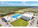Community pool with a splash pad, playground, and well-maintained green spaces create a recreational haven at 1836 W Isles Rd, Port Charlotte, FL 33953