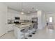 Modern kitchen featuring stainless appliances, granite countertops, and a kitchen island at 1836 W Isles Rd, Port Charlotte, FL 33953